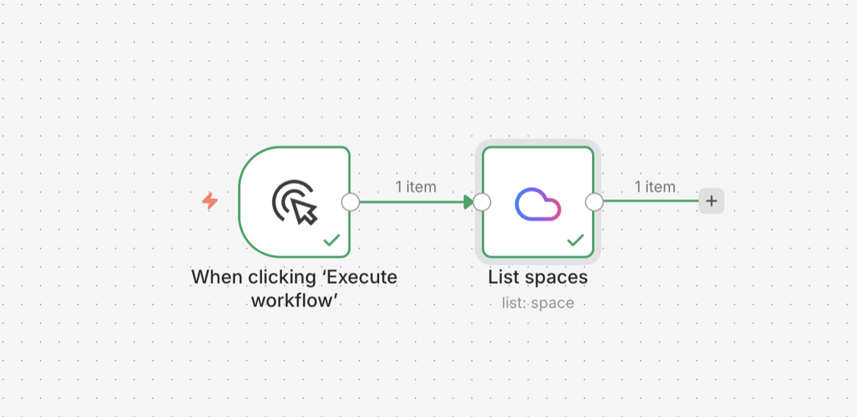 A two-node n8n workflow with a Manual Trigger feeding into a Decoupled Drupal 'List spaces' node, both showing green completion checks.